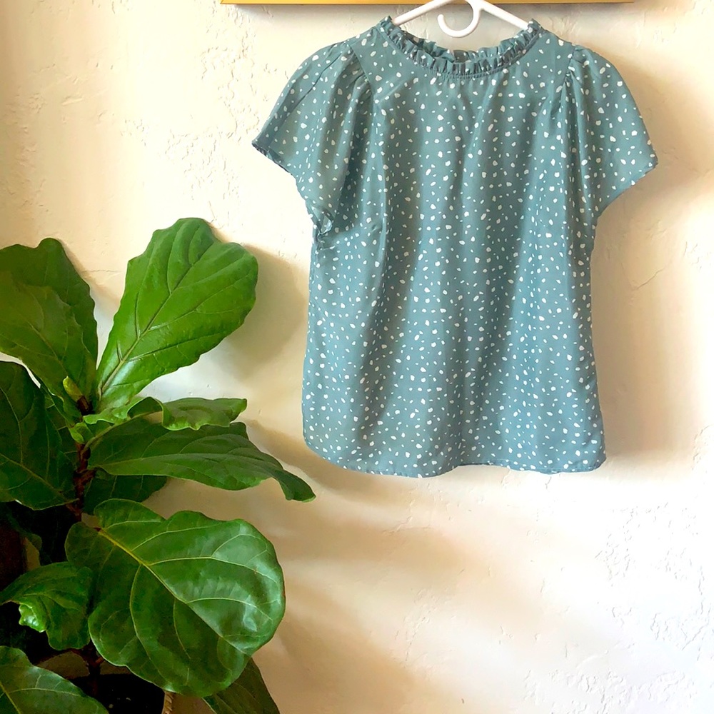 Adorable ruffle neck, flutter sleeve blouse